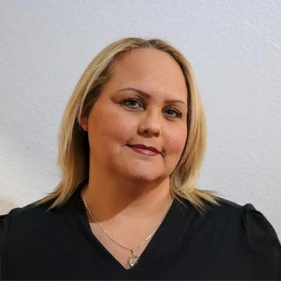 A headshot of Evalee, a staff member at Rawlinson Chiropractic.